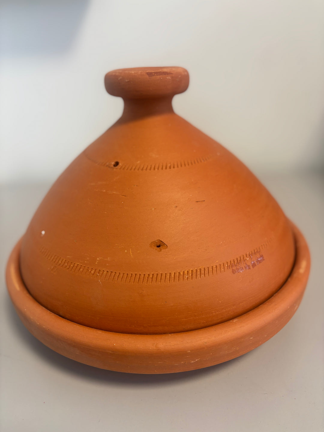 Tajine, glazed clay pot - tapas dish